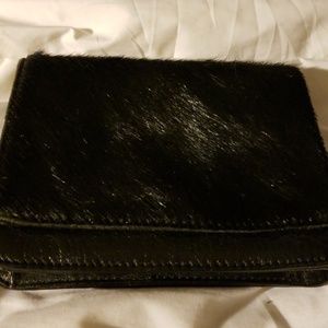 Pouch 5 inches wide and 4 inches height. 3.7 inche